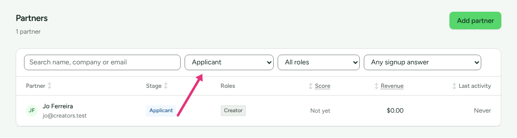 The Partners list narrowed to Applicant, showing Jo Ferreira, with an arrow at the stage filter.