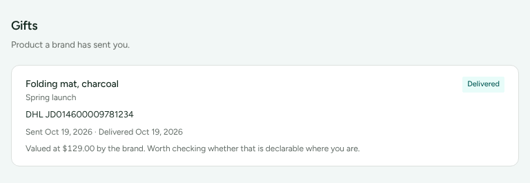 The Gifts page in the partner portal, with a parcel the brand has sent, its tracking number, its Delivered status and its value.