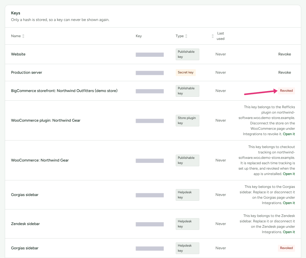 The Keys list on Settings › Developer › API keys, with each key's masked first characters, its type and its Last used column, and an arrow at a Revoked badge.